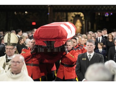 RCMP pallbearers carry the casket into the funeral of former prime minister Brian Mulroney, in Montreal, Saturday, March 23, 2024.