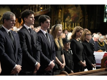 Brian Mulroney's immediate family members look on from the pew during the funeral of former prime minister Brian Mulroney, in Montreal, Saturday, March 23, 2024.
