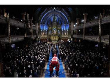 The casket is carried out at the end of the funeral of former prime minister Brian Mulroney, in Montreal, Saturday, March 23, 2024.