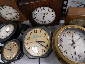 A selection of vintage clocks are displayed at Electric Time Company, Tuesday, Nov. 1, 2022, in Medfield, Mass.