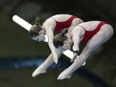 Kate Miller and Caeli McKay of Canada compete during the women's 10m synchronized platform final at the World Aquatics Diving World Cup 2024 in Montreal, Saturday, Mar. 2, 2024.