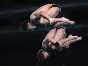Paris Olympics-bound Canadians Nathan Zsombor-Murray and Rylan Wiens placed fifth in the men's 10-metre synchronized competition Sunday at the World Aquatics Diving World Cup. Wiens and Zsombor-Murray compete during the Men's synchronized 10m platform diving final at the World Aquatics Championships in Doha, Qatar, Thursday, Feb. 8, 2024.