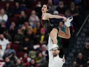 Deanna Stellato-Dudek and Maxime Deschamps of Vaudreuil-Dorion perform their free skate program in the pairs competition during the 2024 ISU World Figure Skating Championships in Montreal on Thursday, March 21, 2024.