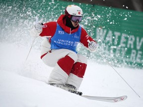 Quebecer Mikaël Kingsbury competes in the men's World Cup freestyle moguls skiing competition in Waterville Valley, N.H., on Jan. 26, 2024.