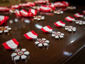 Rows of medals sit ready to be presented to officers and members of the Order of Canada.