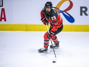 Star captain Marie-Philip Poulin will lead a veteran Canadian team at the 2024 women's world hockey champion. Poulin (29) moves the puck against the United States during second period Rivalry Series women's hockey action in Regina, Friday, Feb. 9, 2024.
