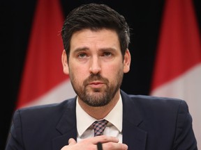 Minister of Housing, Infrastructure and Communities Sean Fraser speaks at a news conference in Ottawa on Tuesday, Feb. 13, 2024.