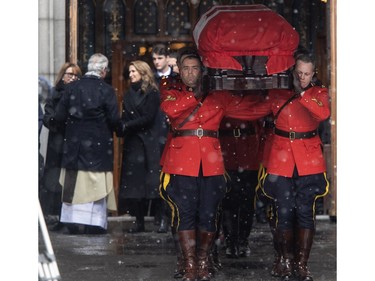 The casket of Brian Mulroney, Canada's 18th prime minister, is taken away at Notre-Dame Basilica on Saturday, March 23, 2024, in Montreal.