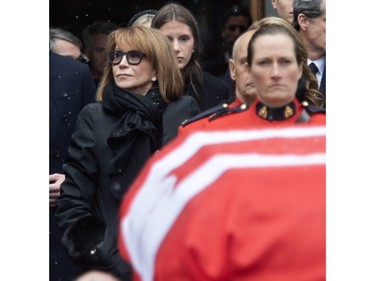 Mila Mulroney looks away as the casket of her husband and Canada's 18th prime minister Brian Mulroney is taken away at Notre-Dame Basilica on Saturday, March 23, 2024, in Montreal.