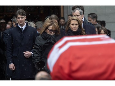 Mila Mulroney and her daughter Caroline Mulroney watch as the casket of Canada's 18th prime minister, Brian Mulroney, is taken away at Notre-Dame Basilica on Saturday, March 23, 2024, in Montreal.