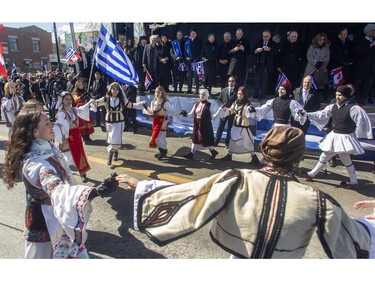 Prime Minister Justin Trudeau and Greek Prime Minister Kyriakos Mitsotakis, along with other dignitaries, watch performers from the reviewing stand during the Greek Independence Day Parade on Sunday, March 2, 2024.