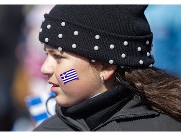 A youngster takes part in the 2024 Greek Independence Day Parade on Sunday, March 24, 2024.