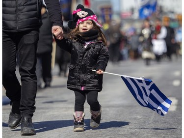 A youngster takes part in the Greek Independence Day Parade on Sunday, March 24, 2024.