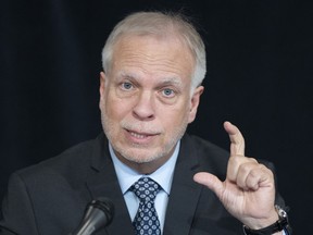 Quebec public health director Dr. Luc Boileau gestures during a news conference in Montreal, Thursday, Feb. 2, 2023.