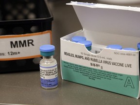 A dose of the measles, mumps and rubella vaccine is displayed at the Neighborcare Health clinics at Vashon Island High School in Vashon Island, Wash.