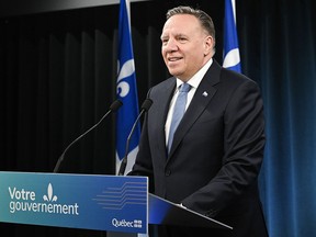 Quebec Premier François Legault speaks to the media in Montreal on Feb. 29, 2024, where he gave his reaction to the Quebec Court of Appeal's decision on the province's secularism law, known as Bill 21.