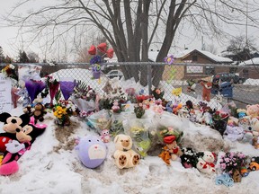 A memorial is shown at the site of the daycare centre bus crash in Laval on Feb. 9, 2023.