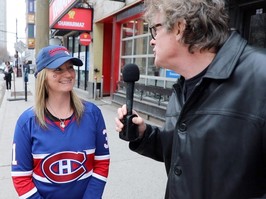 Gazette reporter Brendan Kelly talks to Canadiens fan Jennifer Lane outside McLean's Pub in Montreal.