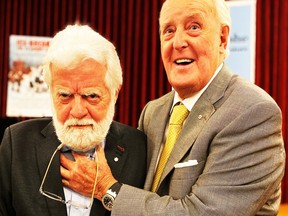 Photo shows former prime minister Brian Mulroney mock strangling The Gazette's editorial cartoonist Terry Mosher a.k.a. Aislin.
