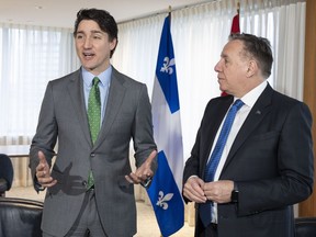 Prime Minister Justin Trudeau, left, attends a bilateral meeting with Quebec Premier François Legault in Montreal on Friday, March 15, 2024.