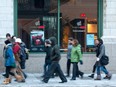 Pedestrians are seen on McGill College Ave. in Montreal on Wednesday, Feb. 8, 2012.