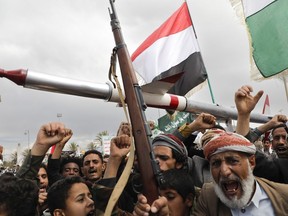 Houthi supporters attend a rally against the U.S. airstrikes on Yemen and the Israeli offensive against the Palestinians in Gaza SAtrip, in Sanaa, Yemen, March 8, 2024.