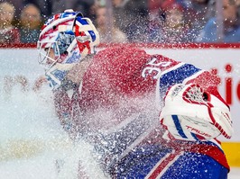 A close-up of Canadiens goalie Samuel Montembeault getting showered by ice spray during a February game at the Bell Centre..