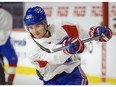 Rocket defenceman Justin Barron follows through on a slapshot during practice at the Place Bell Sports Complex in Laval last month.