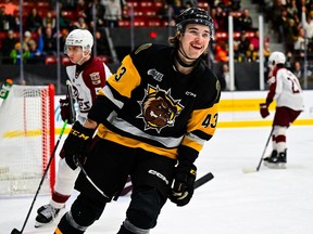 Florian Xhekaj, 19, is seen skating front and centre with a big smile on face after scoring a goal in OHL action.