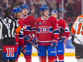 Three Canadiens players chirp at their opponents as an official stands nearby