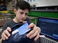 Adam Hamdaqa shows the components of his Guardian Helmet project at Pierrefonds Community High School on April 3, 2024. The project recently won first prize honours at Hydro-Québec's recent Montreal Regional Science and Technology Fair.