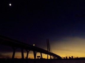 The Champlain Bridge is cloaked in darkness during the total eclipse