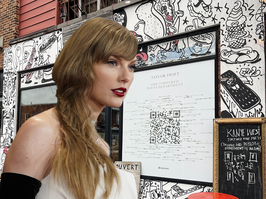 Composite photo of Taylor Swift in a white dress and a large QR code on the side of a building