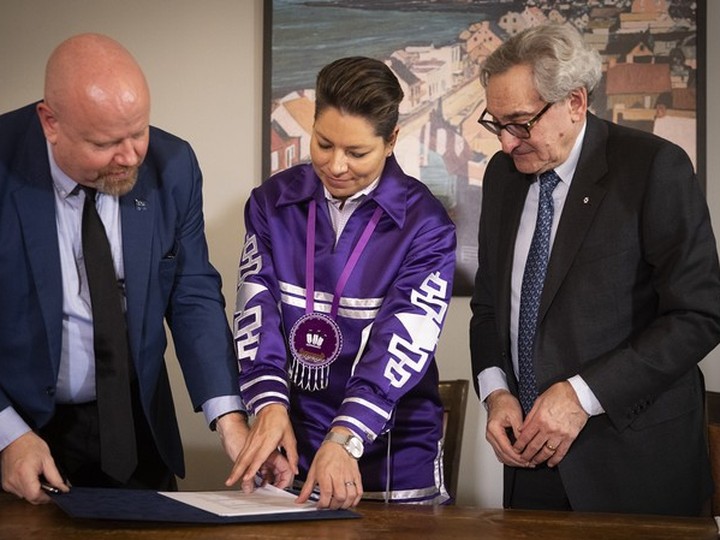  Ian Lafrenière, left, Quebec minister responsible for relations with the First Nations and the Inuit, Kahnawake Grand Chief Kahsennenhawe Sky-Deer and Hydro-Québec CEO Michael Sabia sign a co-ownership agreement for a transmission line exporting electricity to New York City on Thursday April 18, 2024.