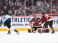 Sarah Nurse #20 of Toronto scores the game-winning goal in overtime on Ann-Renée Desbiens #35 of Montreal in PWHL action at the Bell Centre on April 20, 2024 in Montreal.