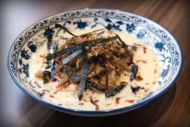 Mixed mushrooms with miso beurre blanc with chili crisp and nori at Oncle Lee restaurant in Mile End is seen Thursday, April 18, 2024.