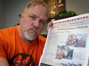 Steve Bonspiel chief fundraiser for Sharing our Stories insert in the Eastern Door of Kahnawake shows of one of the sections on Thursday April 18, 2024.