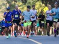 A group of people run in the Montreal marathon