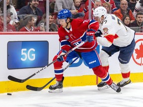 Canadiens' Jake Evans skates away from Panthers' Niko Mikkola during game at the Bell Centre in November.