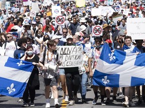 People take part in a demonstration against Bill 96 in Montreal in 2022. On the island of Montreal, often the subject of much hand-wringing over the "Bonjour-Hi" greeting in downtown businesses, the use of English dipped to about 17 per cent in 2022 from 23 per cent in 2016.