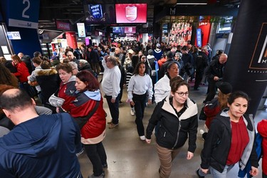 PWHL fans make their way to Montreal's Bell Centre ahead of the game between Montreal and Toronto on April 20, 2024.