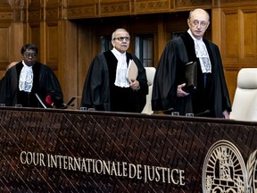 Court president Nawaf Salam, centre, and other justices are seen at the International Justice court in the Hague, on April 29, 2024.