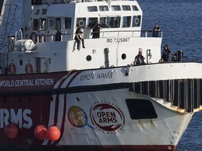 A ship belonging to the Open Arms aid group, one of three ships loaded with canned food destined to Gaza, has returned to the Cypriot port of Larnaca, Cyprus, Wednesday, April 3, 2024.