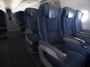 Airline seats are seen during a flight from Vancouver to Calgary on Tuesday, June 9, 2020.