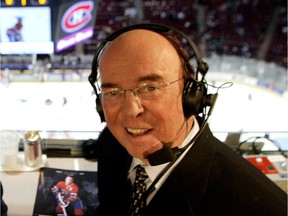Bob Cole smiles as he turns back toward the camera high above the ice