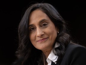 Anita Anand listens to a speaker during a news conference in Ottawa, Monday, Oct. 23, 2023.