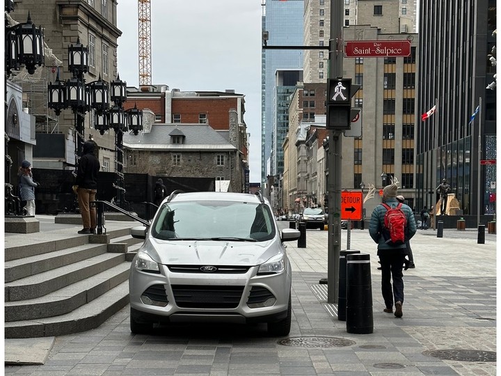 A car parked illegally in front of the Notre-Dame Basilica in December 2022.