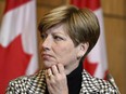 Conservative MP Karen Vecchio listens during a news conference in Ottawa, Tuesday, Nov. 22, 2022.