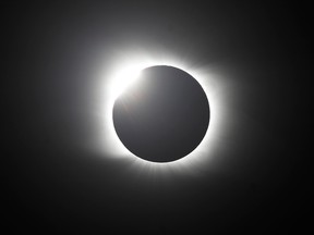 The moon covers the sun during a total solar eclipse