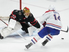 Canadiens centre Nick Suzuki fails to put the puck past Senators goaltender Joonas Korpisalo